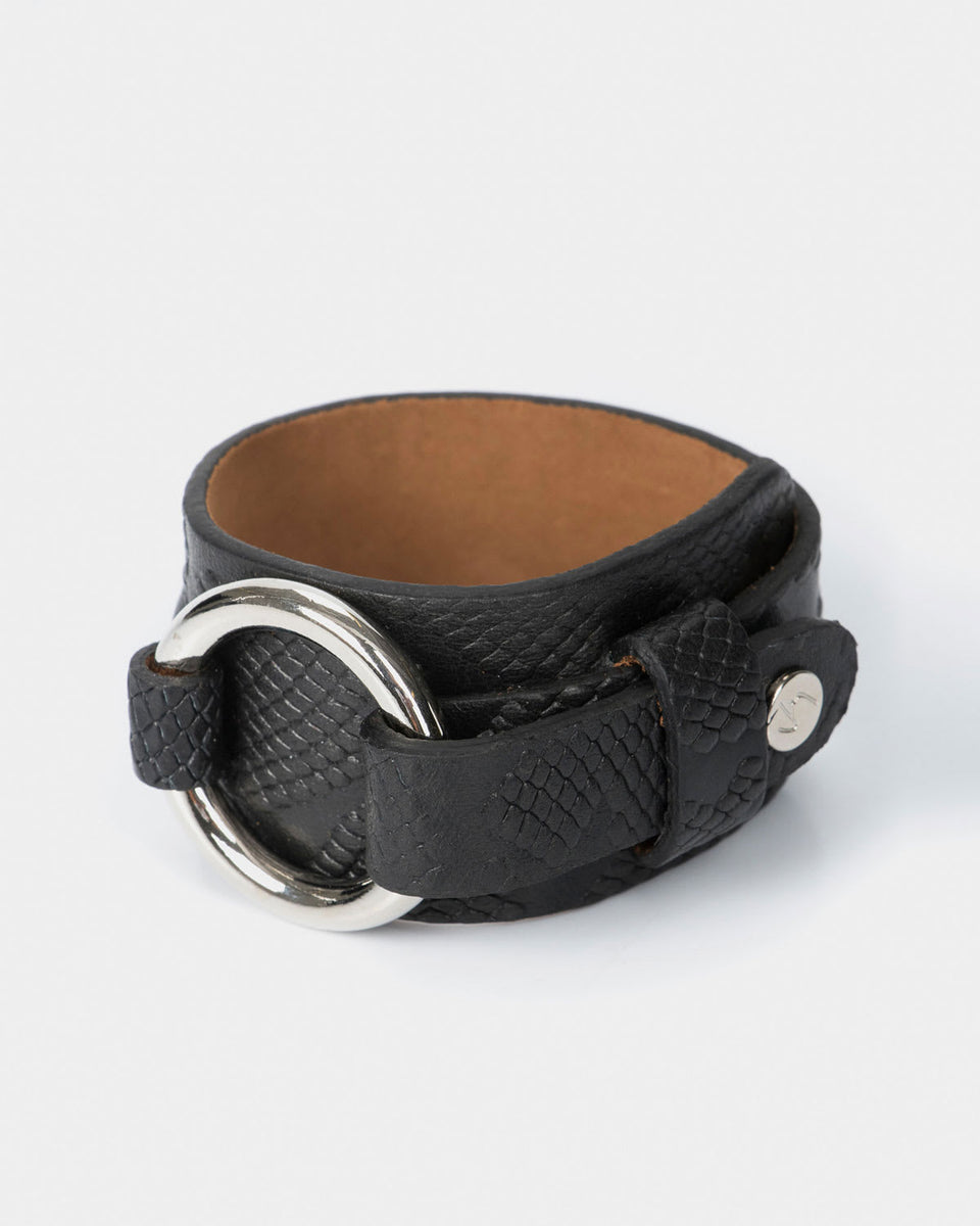 Manilla femenina de cuero Vélez